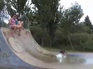 Two girls peeing in a skate park