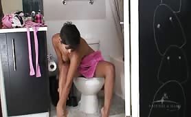 Hairy beauty peeing in toilet