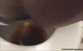 Ebony babe shititng liquid