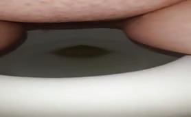 Fat wife pooping in toilet