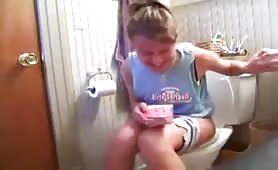 Blonde girl trying to poop
