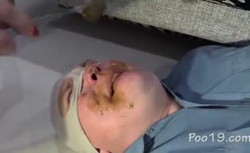 Big turd on slave's face