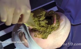 Tanned mistress feeds male slave