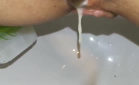 Creampied girl pooping in close up