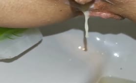 Creampied girl pooping in close up