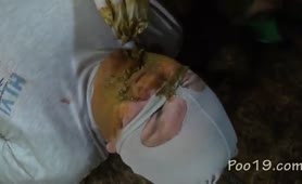Shitting on slave's face