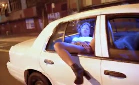 Girls pissing from the window of a moving car