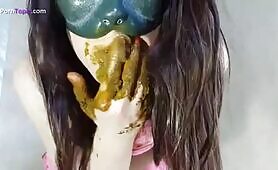 Masked teen smears brown poop on face