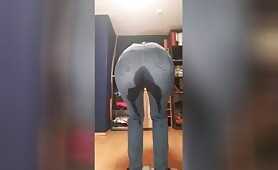 hot wife peeing in blue jeans