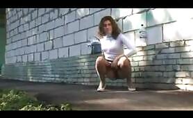 Russian teen caught peeing outdoor