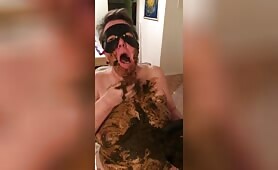 Masked mature lady smearing shit on her body 