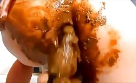 Dirty girl masturbating with a lot of shit  