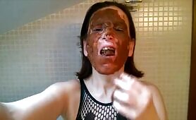 Mature slut doing makeup with shit 