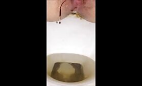 Girl on her period shitting in the toilet 
