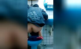 Asian girl pooping and squatting