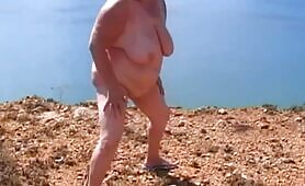 Fat granny shits outdoors