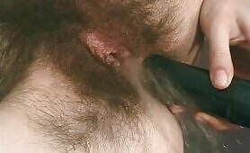 Naughty hairy lady ass toying while pissing 