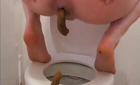 Sweet nerdy teen pissing and pooping in the toilet 