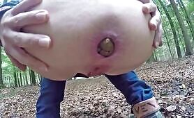 Curvy hot ass lady shitting in the forest 