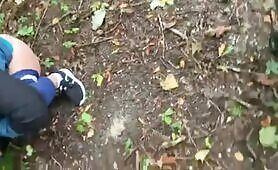 Solo girl doing some peeing in the park 