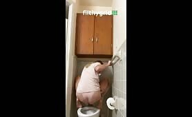 Babe takes a dump on toilet