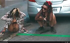 Blonde Woman Crouches on Street and Shits in Zoo Print Pants