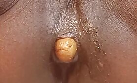 Black Female Smears Shit and Piss on Her Pussy and Ass