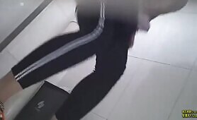 Japanese woman pissing in a dress in the bathroom