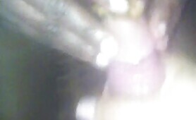 Nude Hand Grips Penis with Fingers Around Shaft in Dark Room