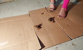 Asian Woman Steps on Cardboard with Shit Smears