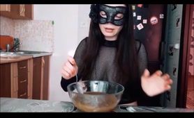 Busty blonde eats shit from a bowl and smears it over her body