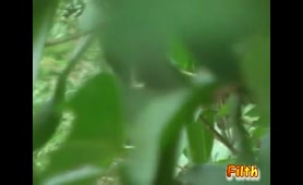 Asian Woman Squats Outdoors and Shits on Bamboo Grass
